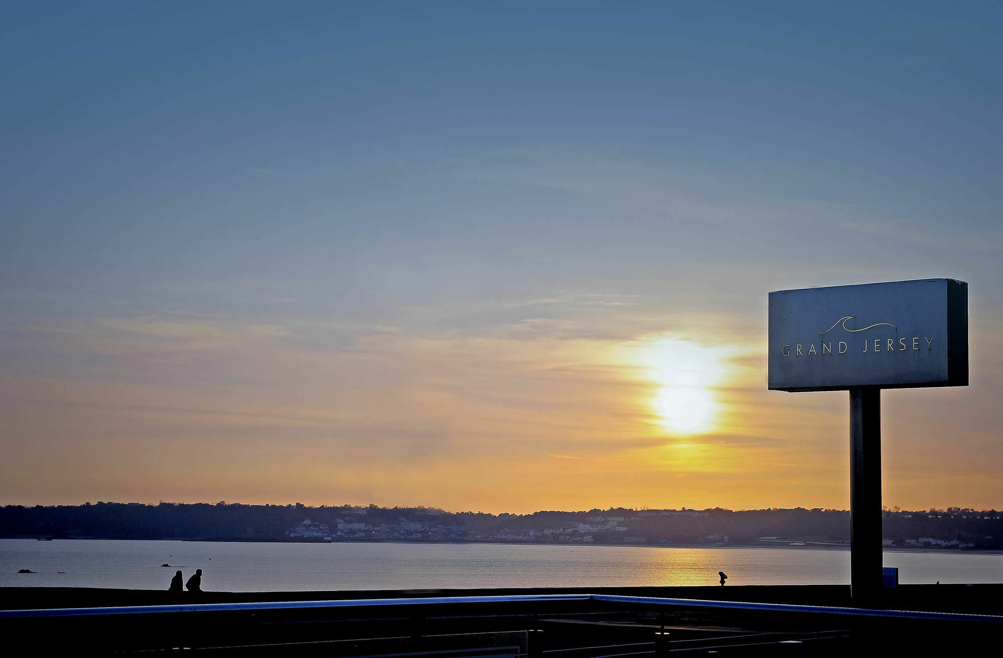Grand Jersey Hotel And Spa Saint Helier Bagian luar foto Sunset at Grand Prairie